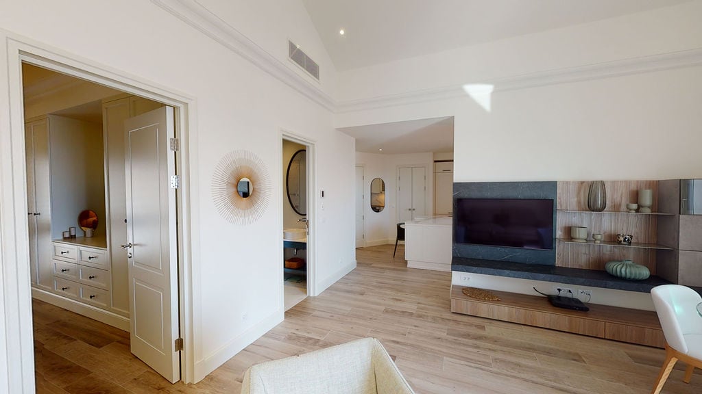 Modern living room with a TV area and bright interior in a luxury apartment, Luštica, Montenegro.
