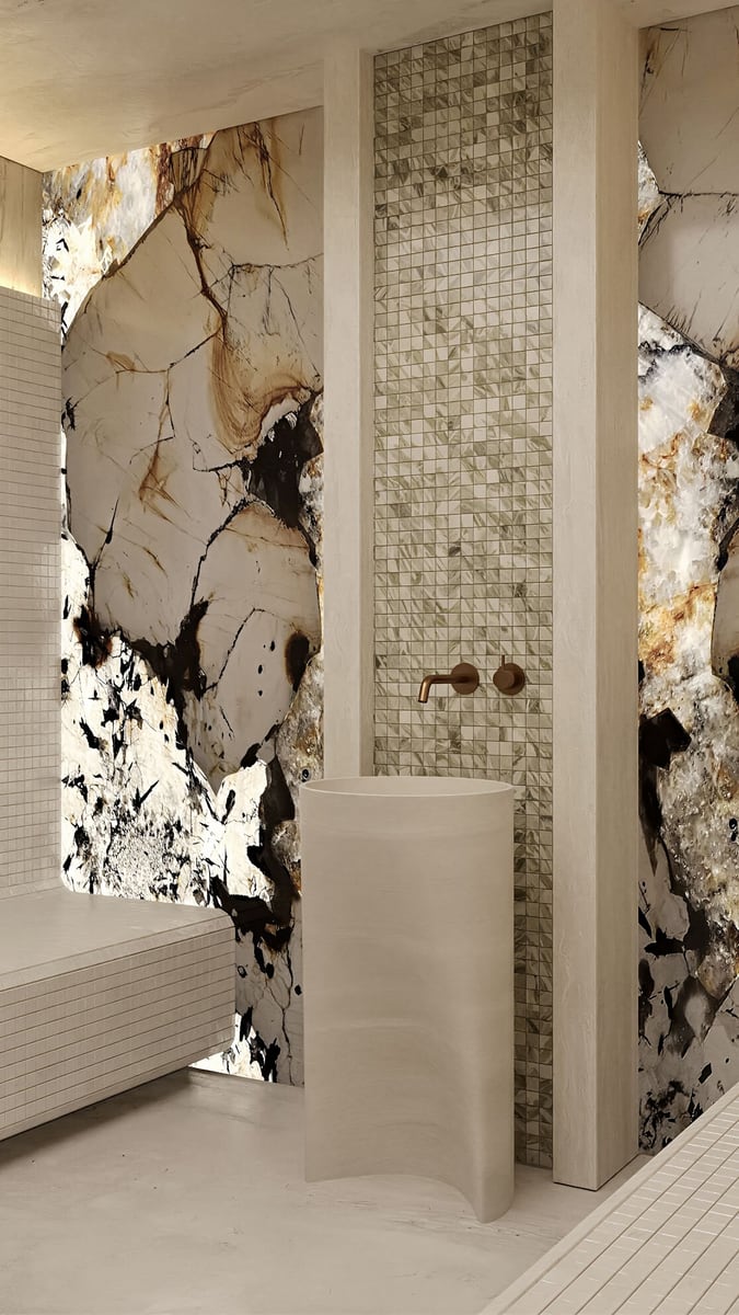 Designer bathroom in the Kumbor residential complex, Montenegro: natural stone finishes with lighting and a stylish sink.