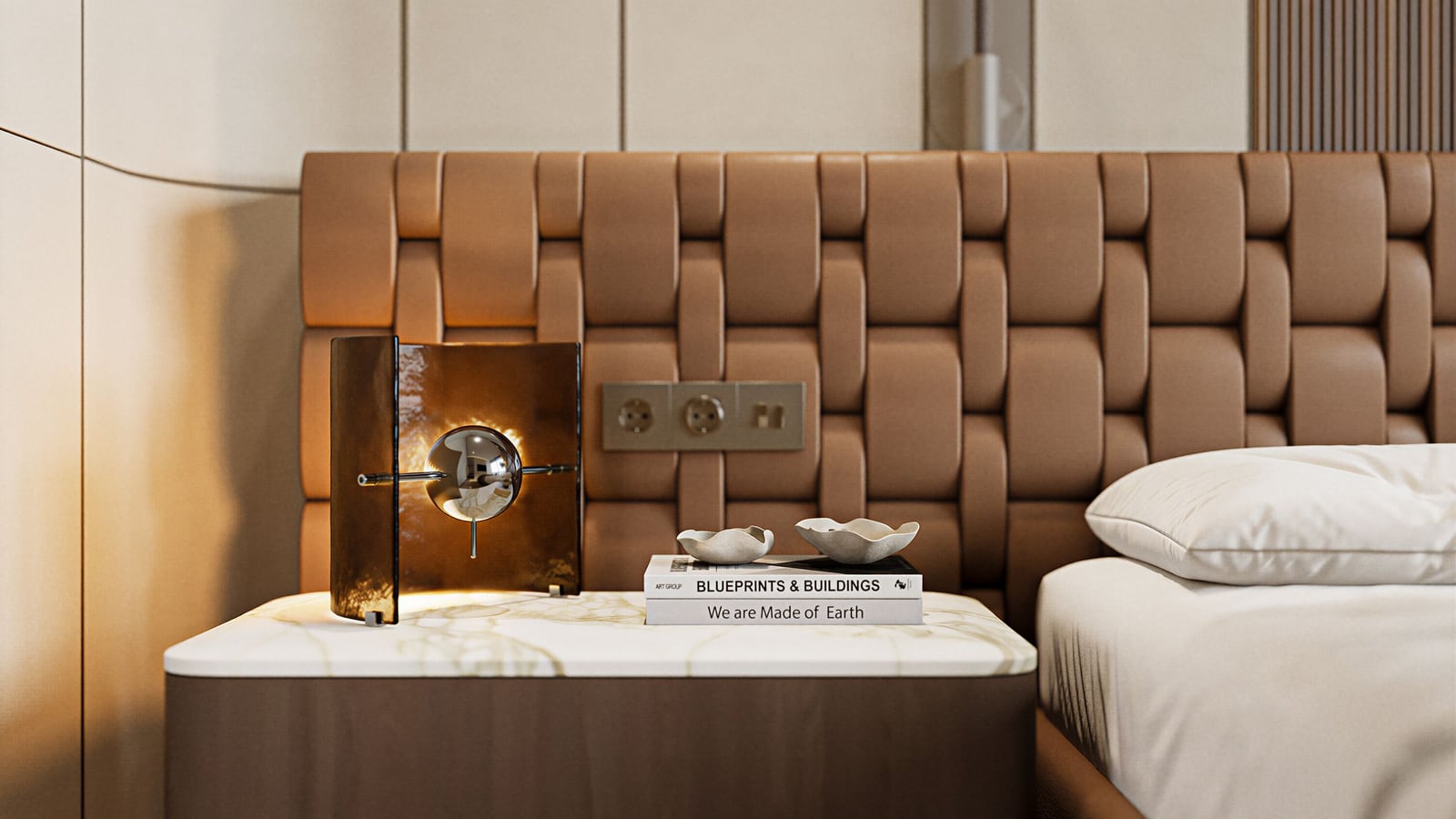 Modern bedroom in Kumbor residential complex, Montenegro: leather headboard, designer lamp, and marble nightstand.