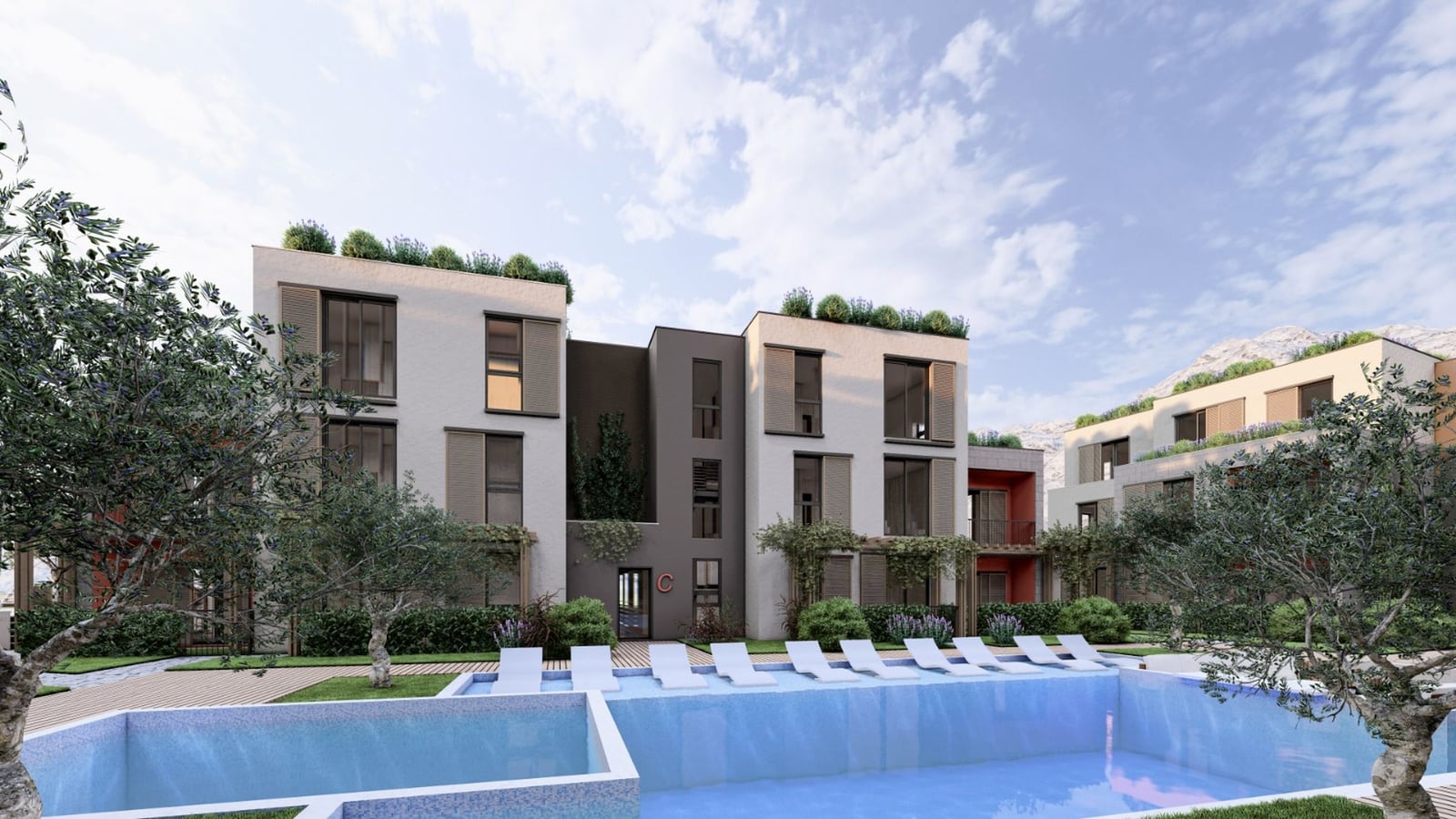 Modern residential complex with a pool and landscaping in Radanovici, Montenegro: view of the building facade.