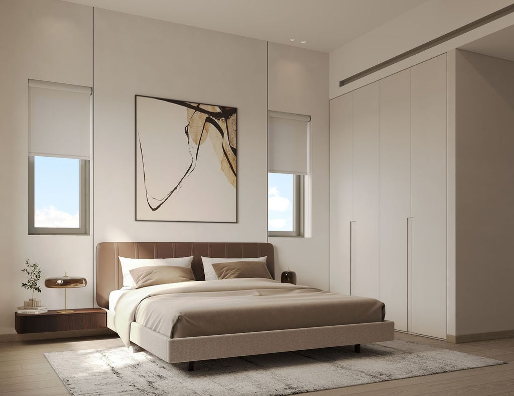 Modern bedroom in an apartment in Luštica, Montenegro: double bed, built-in wardrobe, and stylish interior.