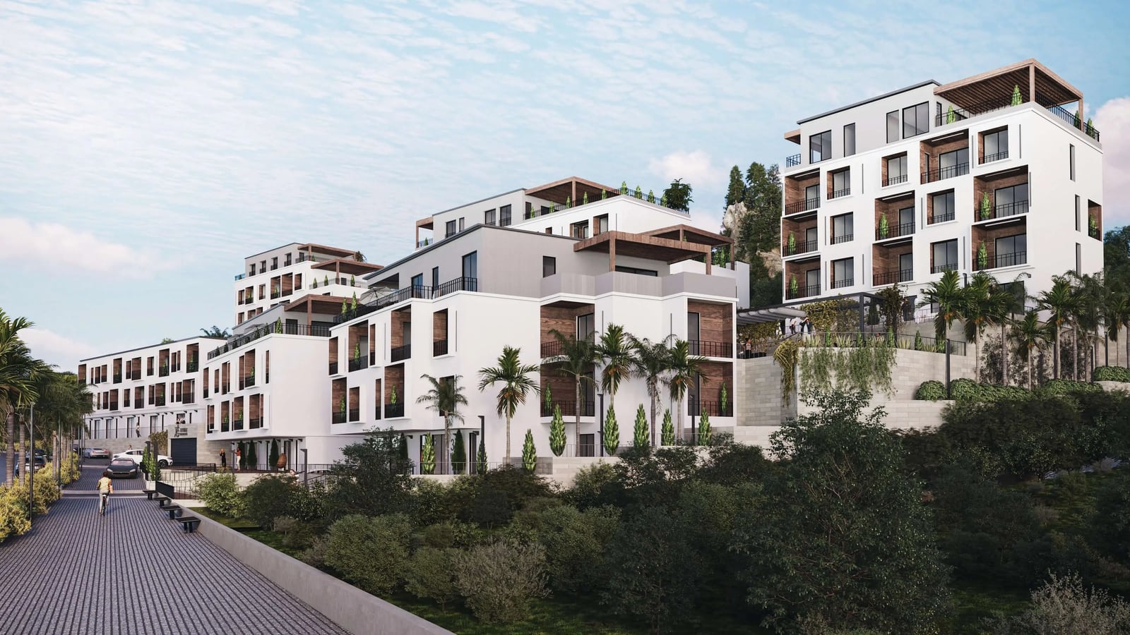 Modern residential complex in Tivat, Montenegro: white facades with wooden trim, terraces, and landscape design.