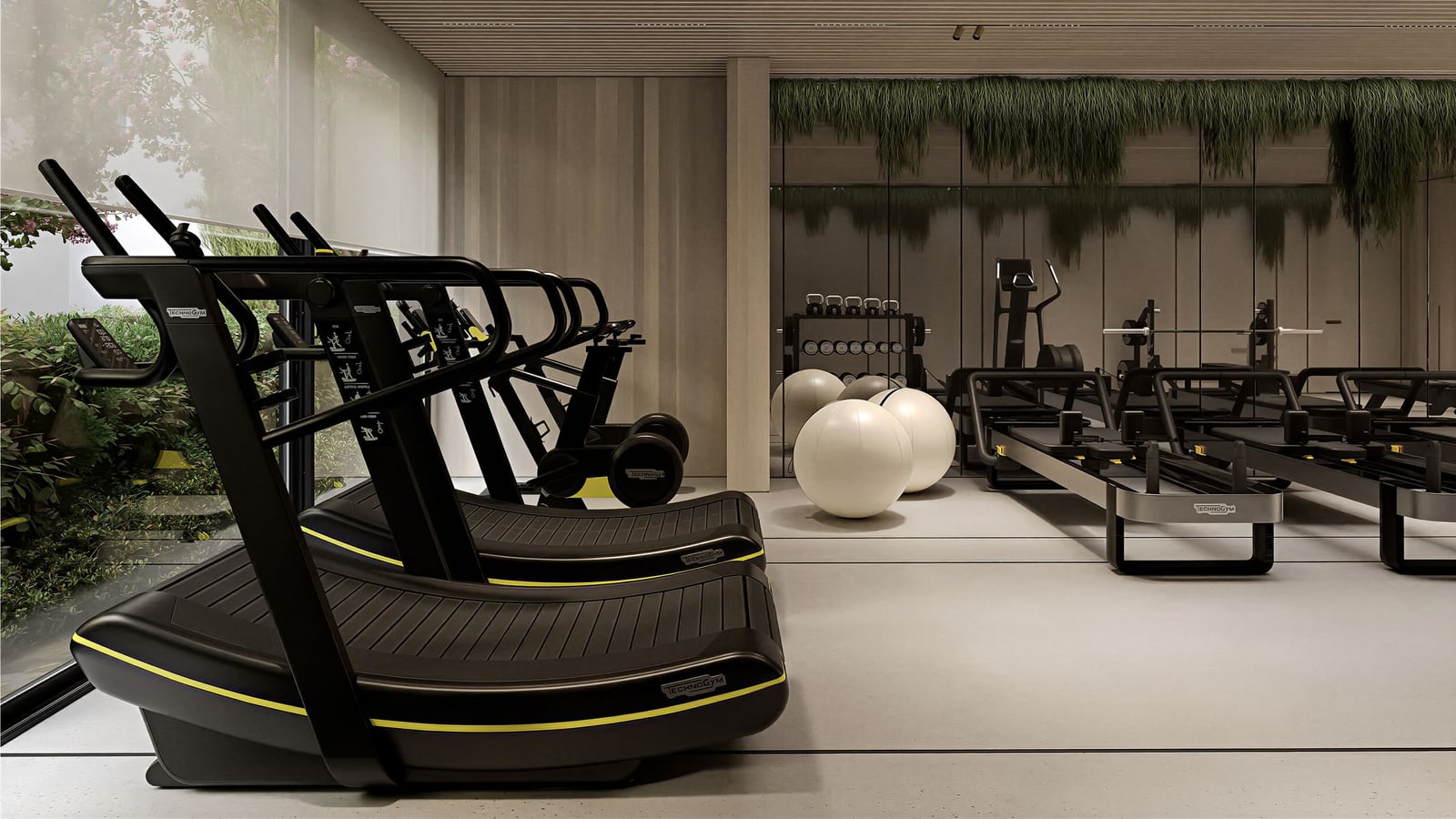 Modern gym with Technogym equipment in a residential complex in Kumbor, Montenegro.
