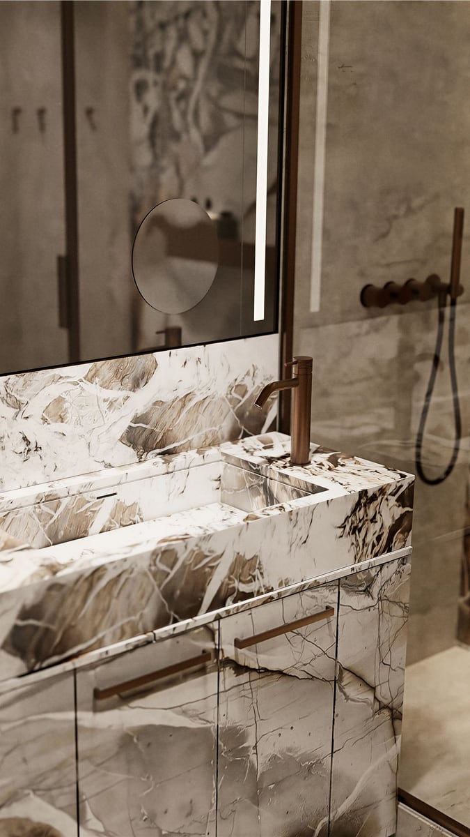 Modern bathroom in the Kumbor residential complex, Montenegro: marble finishes, copper faucet, and backlit mirror.