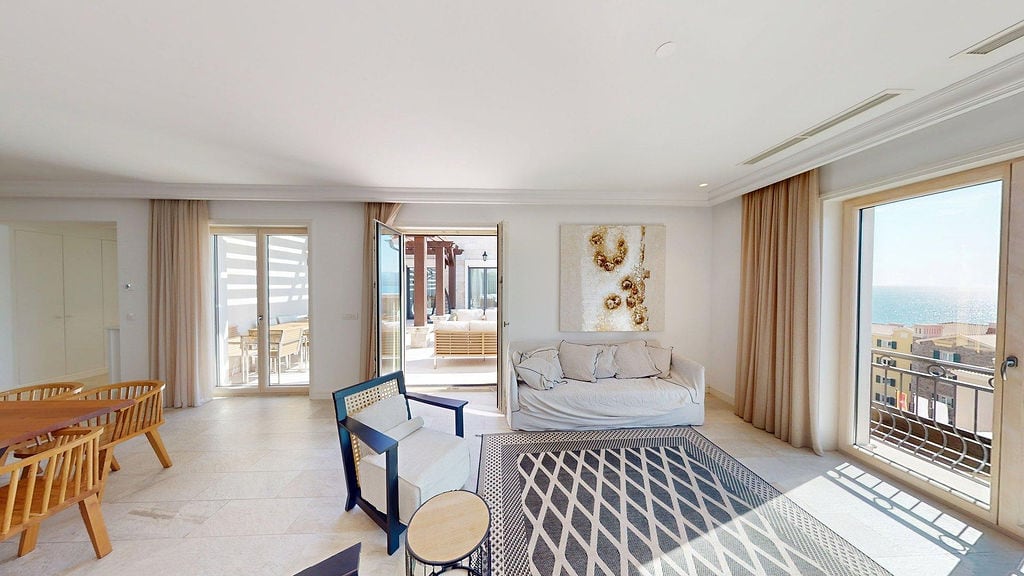 Bright living room with access to a terrace and sea view in the elite residential complex Luštica, Montenegro.