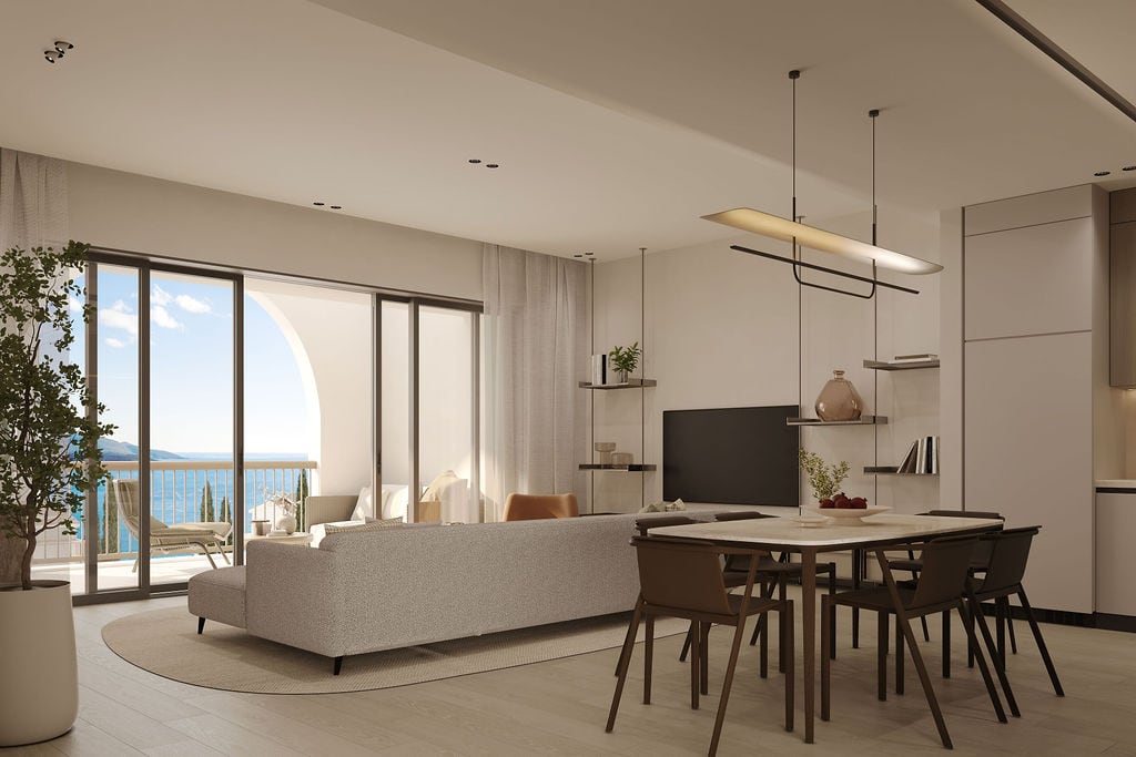 Modern living room with a dining area and sea view in a residential complex, Luštica, Montenegro.