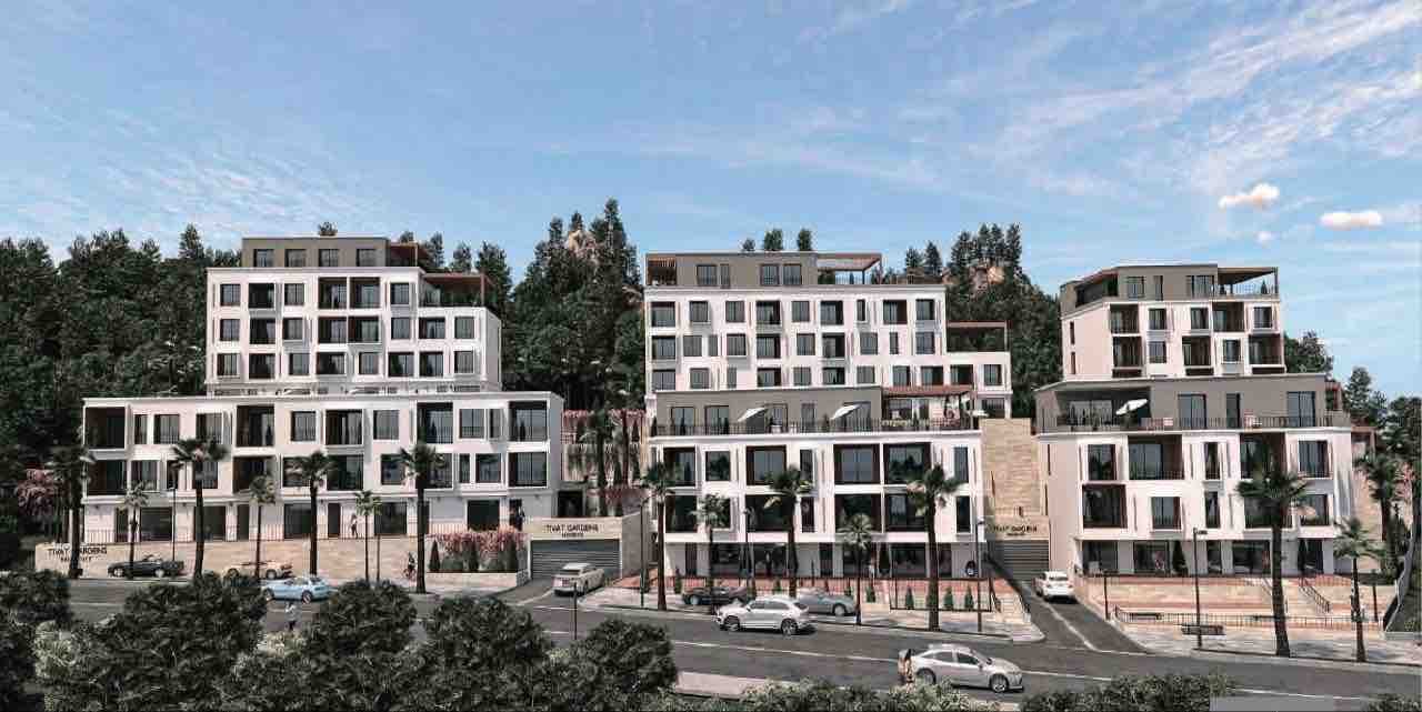 Modern residential complex Tivat Gardens in Tivat, Montenegro: building architecture with terraces and panoramic windows.