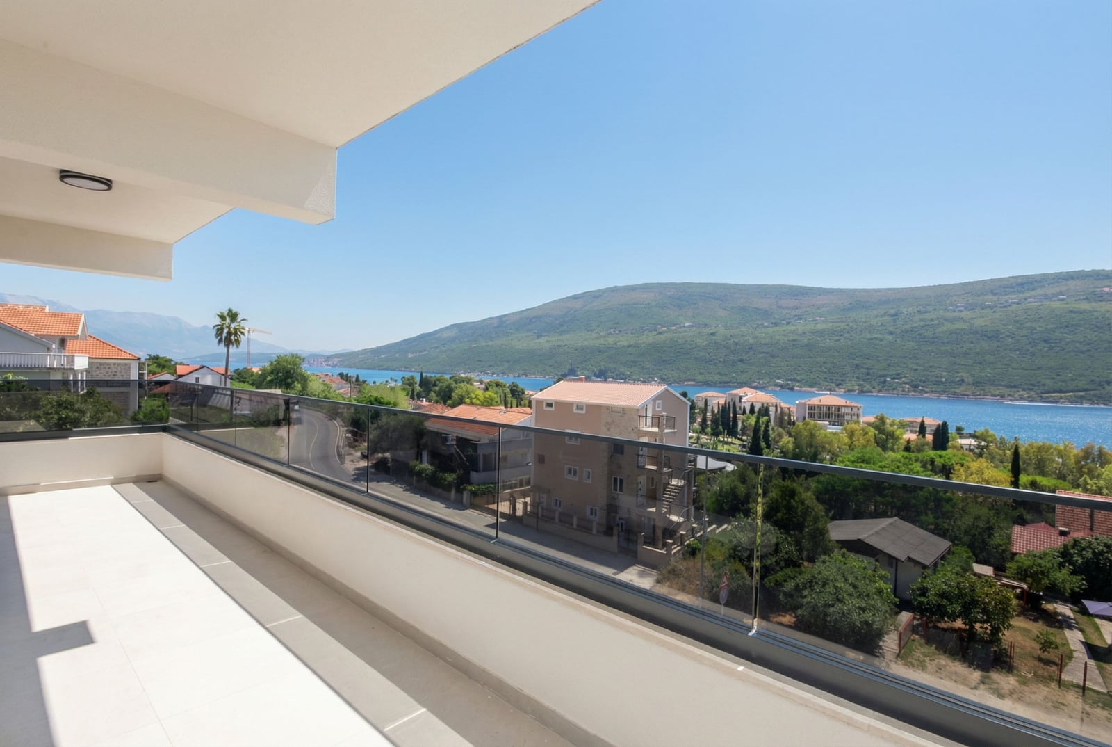 Spacious balcony with panoramic views of the sea and mountains in an apartment, Kumbor, Herceg Novi, Montenegro.