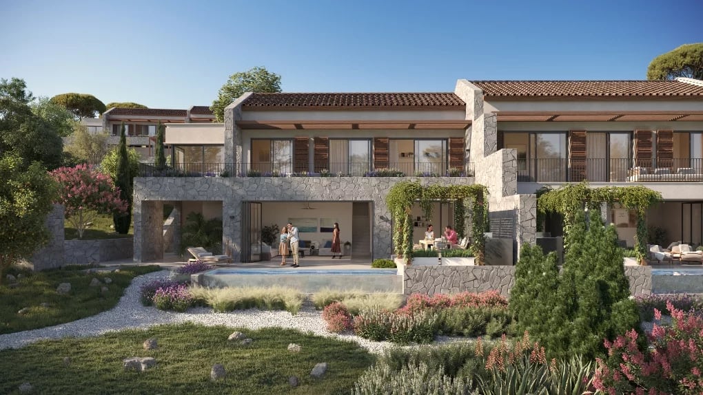 Modern villa in Luštica, Montenegro: stone facade finish, terrace with pool, and landscaped garden.