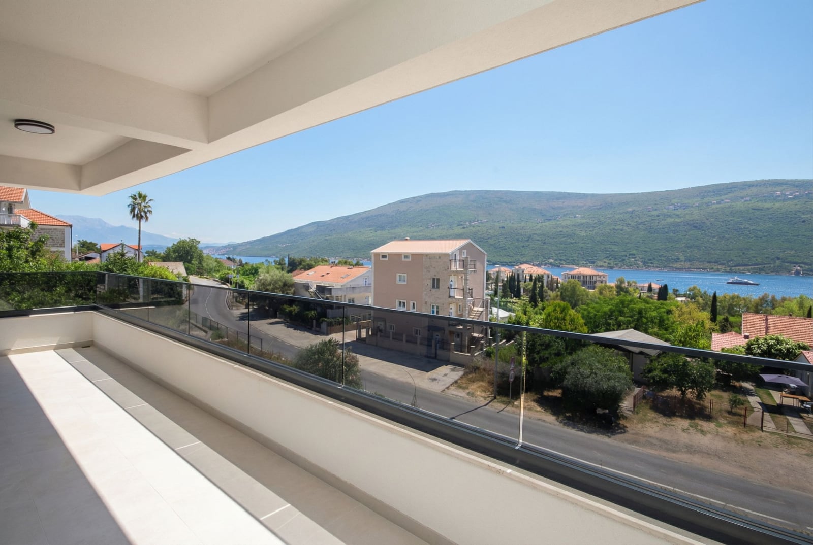 Spacious balcony with panoramic views of the sea and mountains in an apartment, Kumbor, Herceg Novi, Montenegro.
