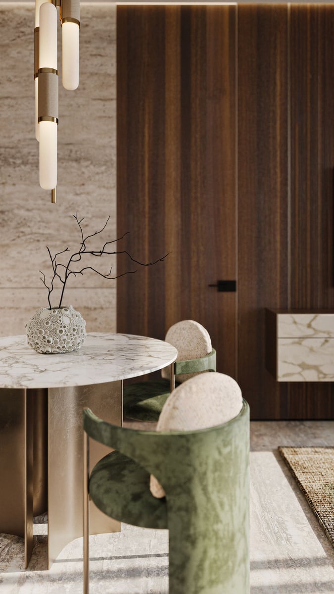 Designer living room in the Kumbor residential complex, Montenegro: marble table, green velvet chairs, and natural wood finishes.