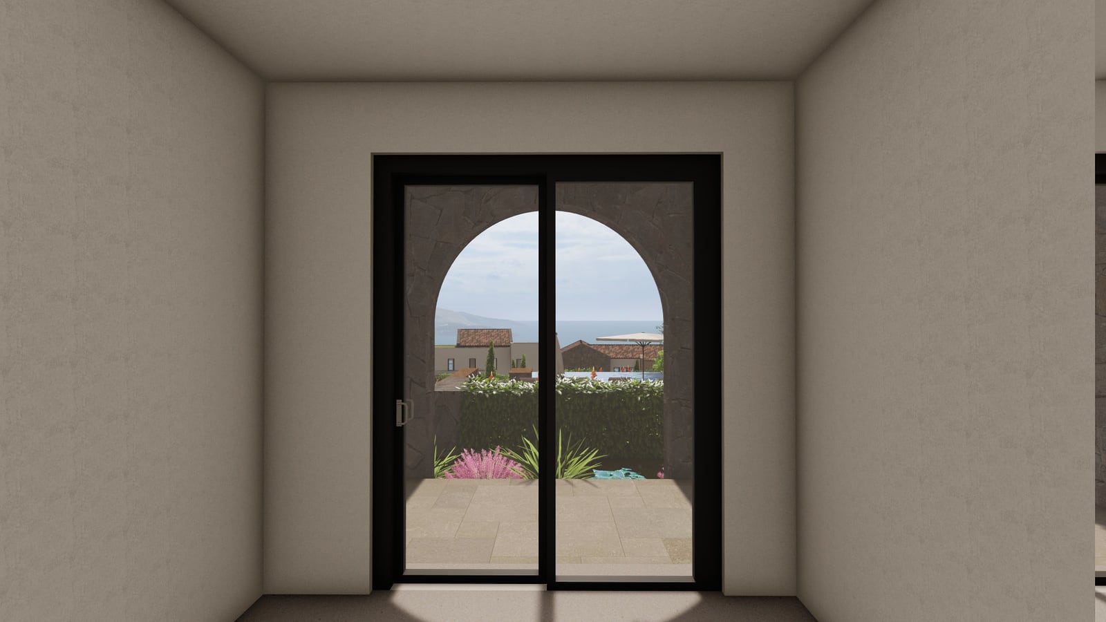 View from the living room to the terrace and the sea in the Lustica Bay apartment, Montenegro: panoramic doors and a stone arch.