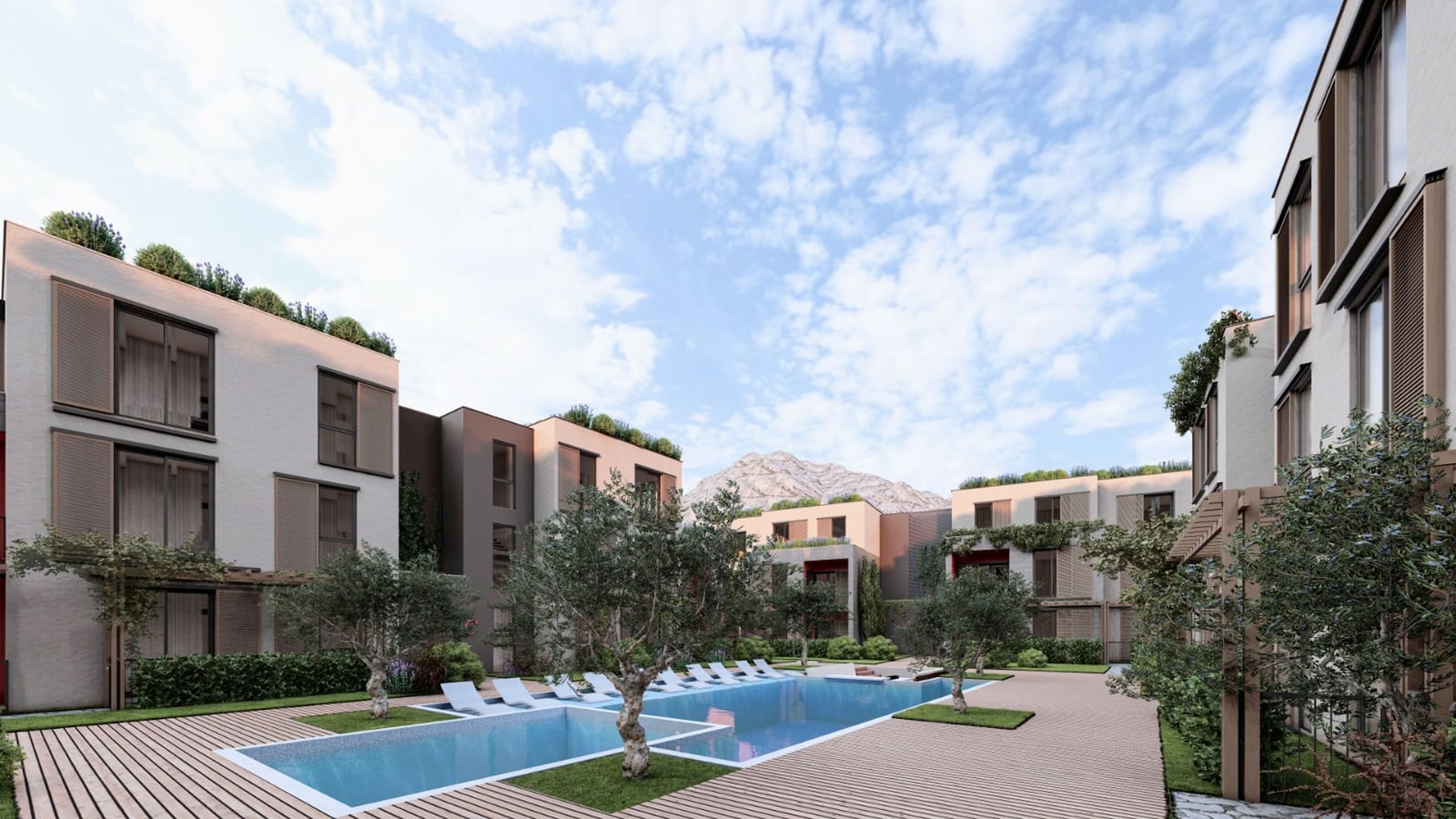 Modern residential complex with a swimming pool and relaxation area in Radanovichi, Montenegro, with mountain views and landscaped design.